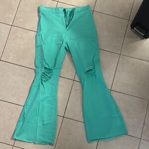 Teal Flared Jeans with Distressed Knees